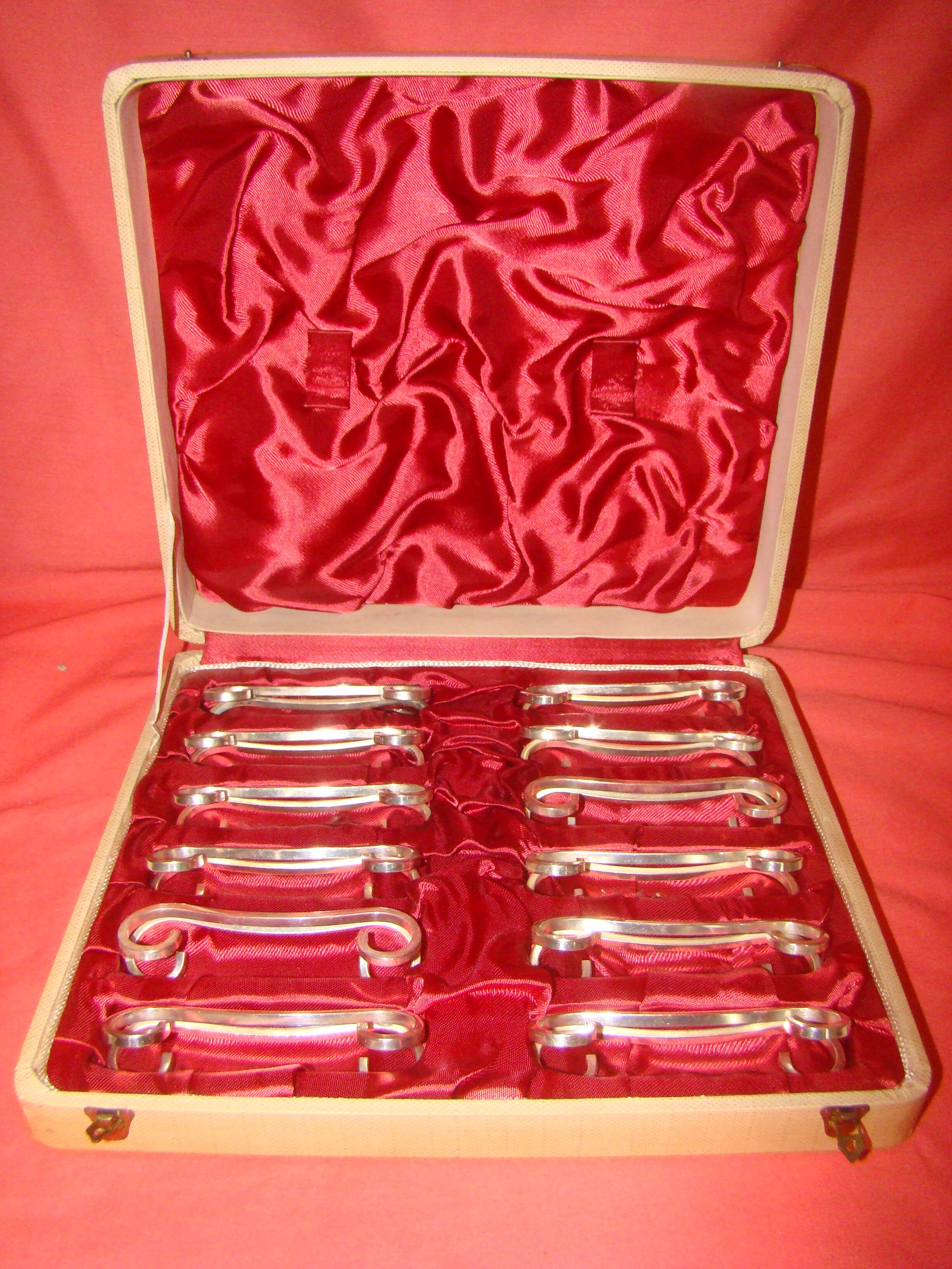 set of 12 silver-plated knife rests from the early 20th century with case