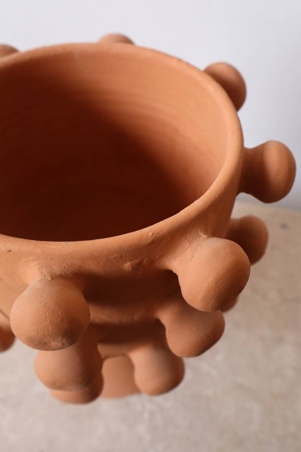 Handmade terracotta sculptural cache pot vase