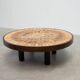 Round coffee table by Roger Capron