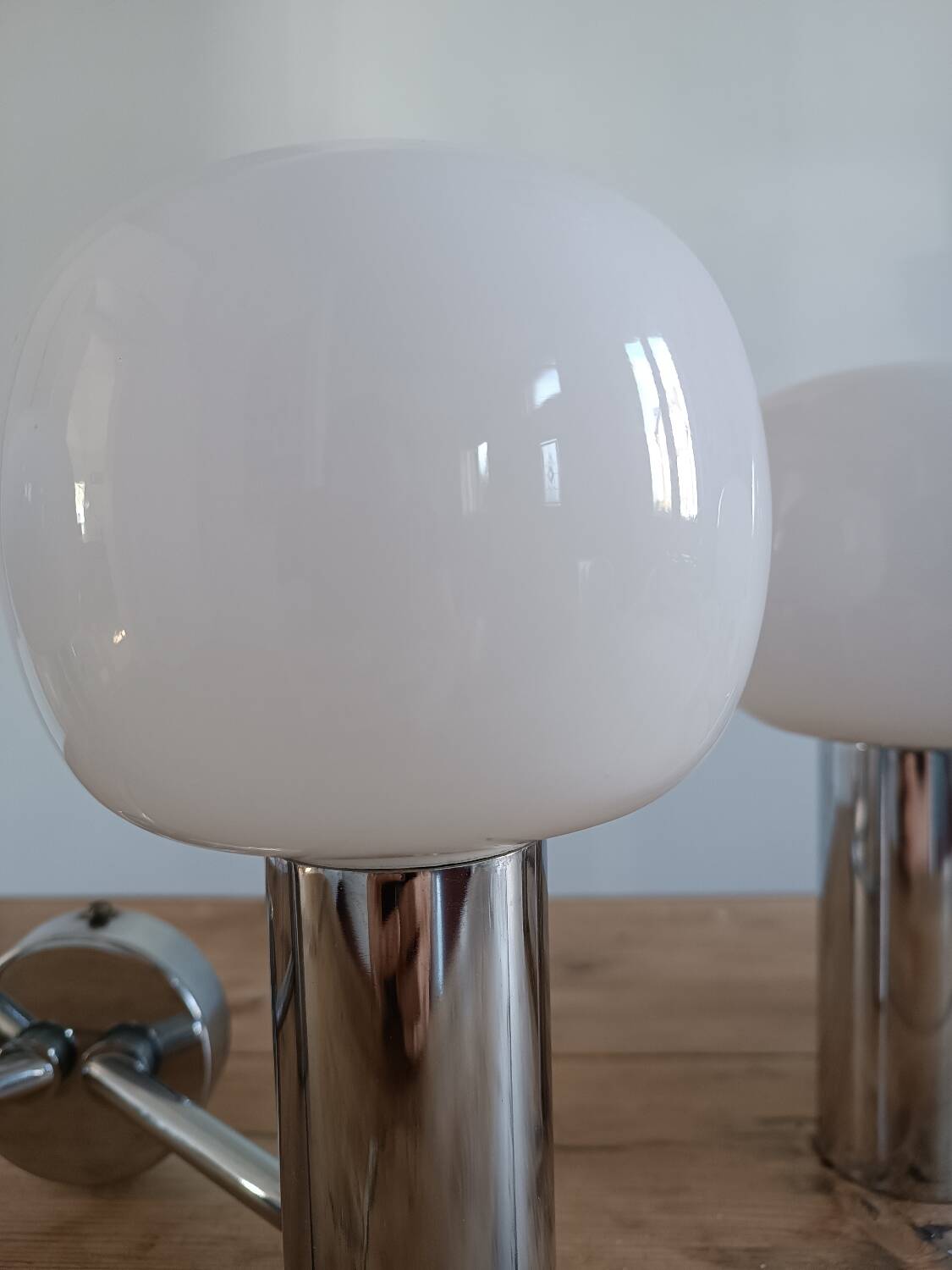 Pair of vintage wall lights in chromed metal and opaline 1970