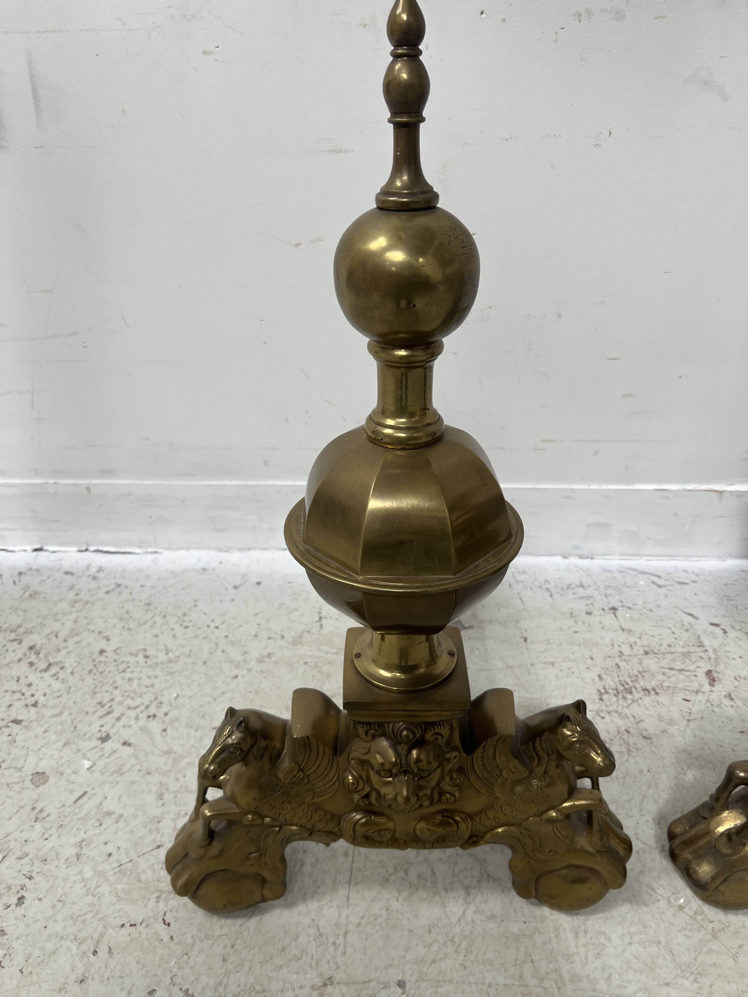Important pair of brass log holders from the 20th century.