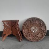 Carved wooden hunting stool decorated with vines