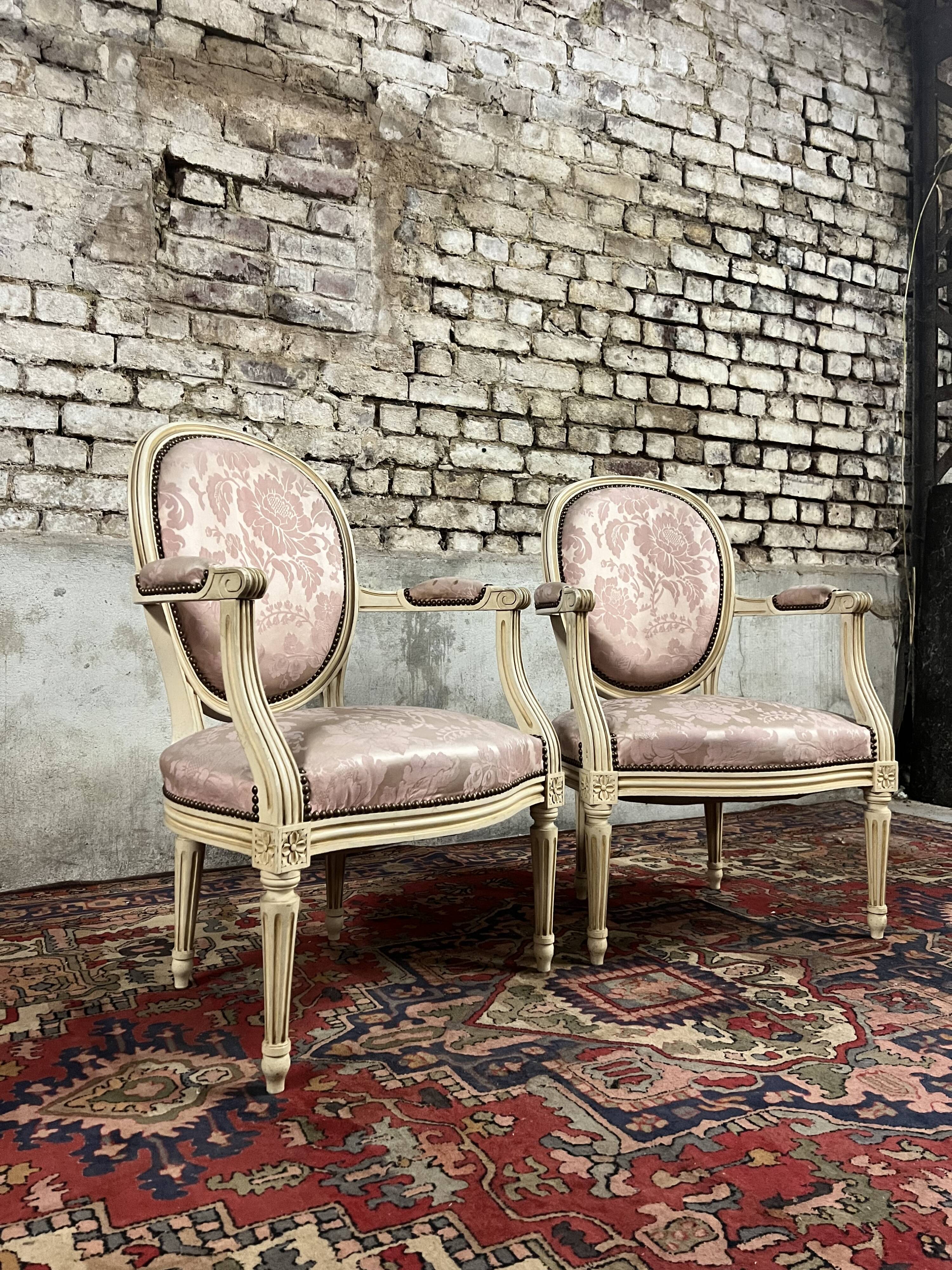 Pair of louis xvi style cream lacquered wood medallion back armchairs