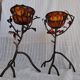 Pair of Art Deco style candle holders in wrought iron and amber blown glass.