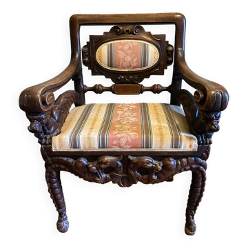 Carved reception armchair, neo-Renaissance style