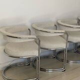 4 vintage tubular metal and fabric chairs