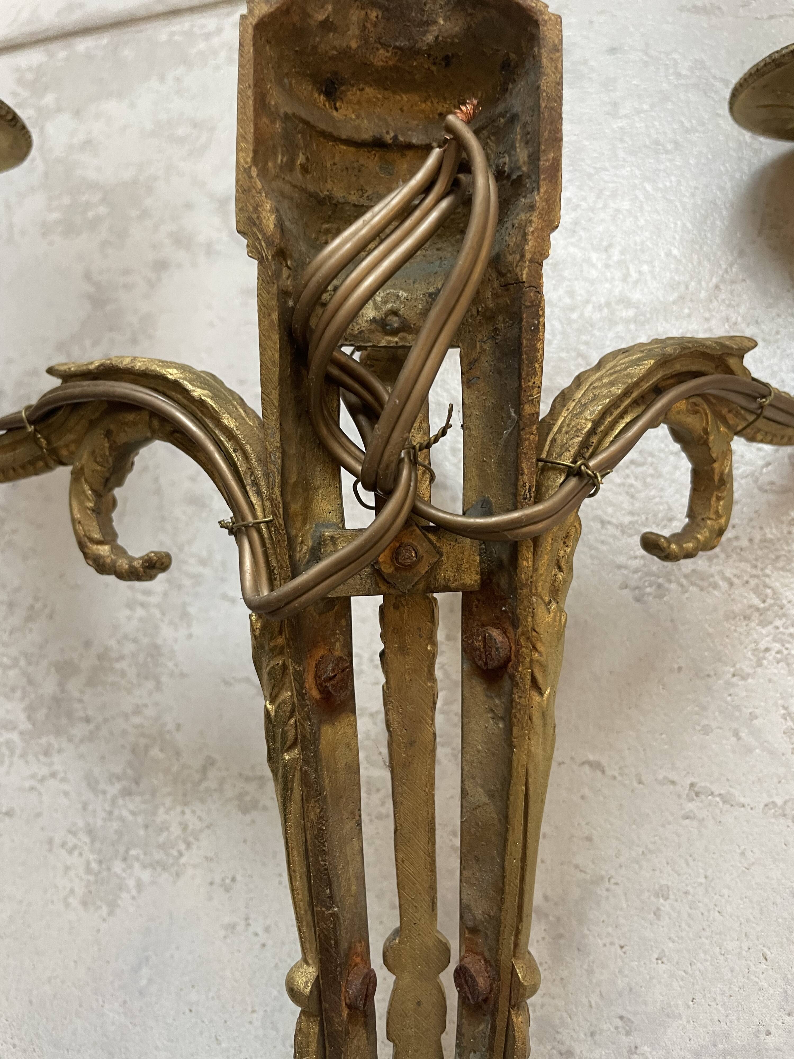 Pairs of Louis XVI bronze wall lamps