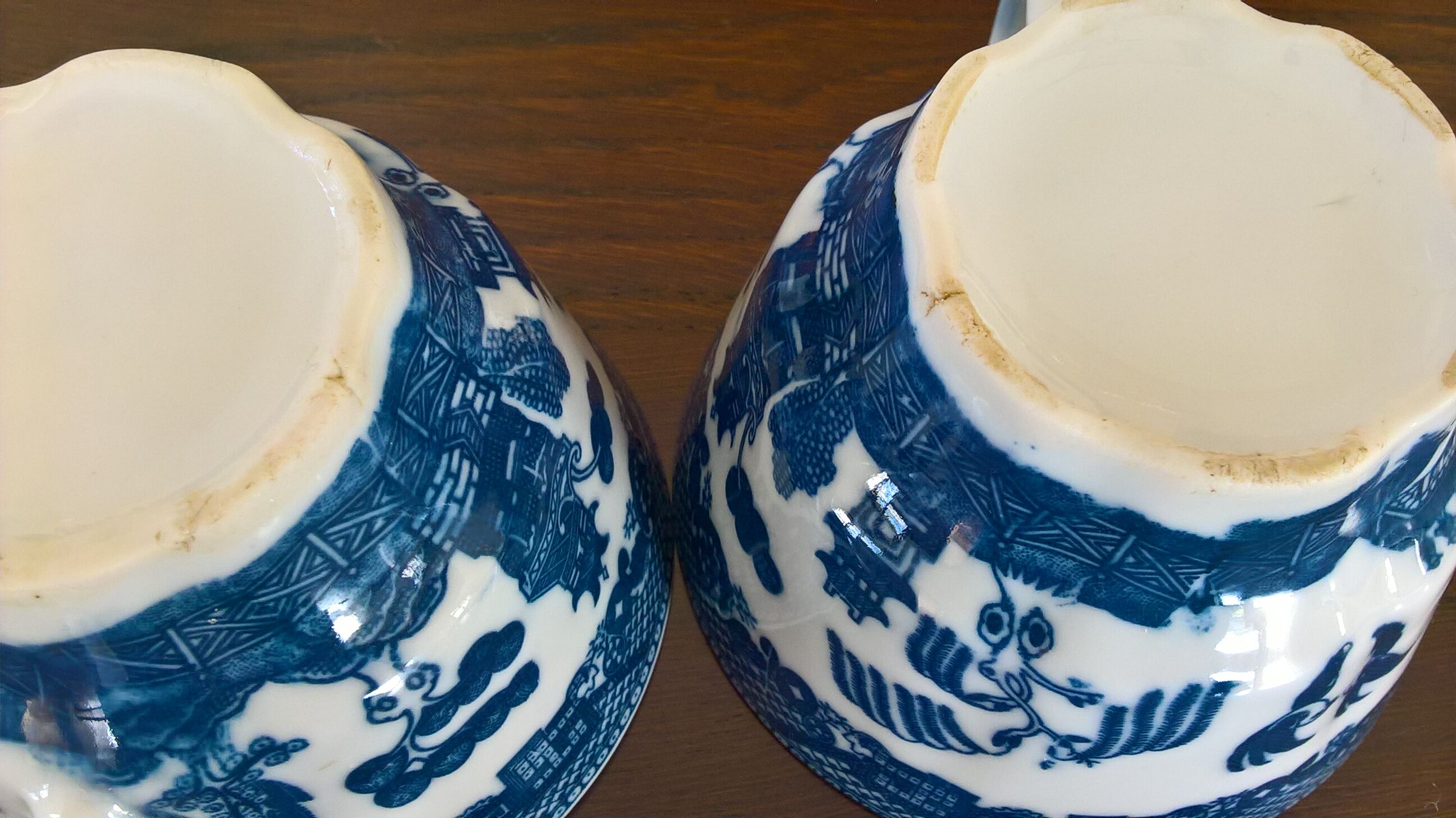 Two Blue Willow porcelain tea cups