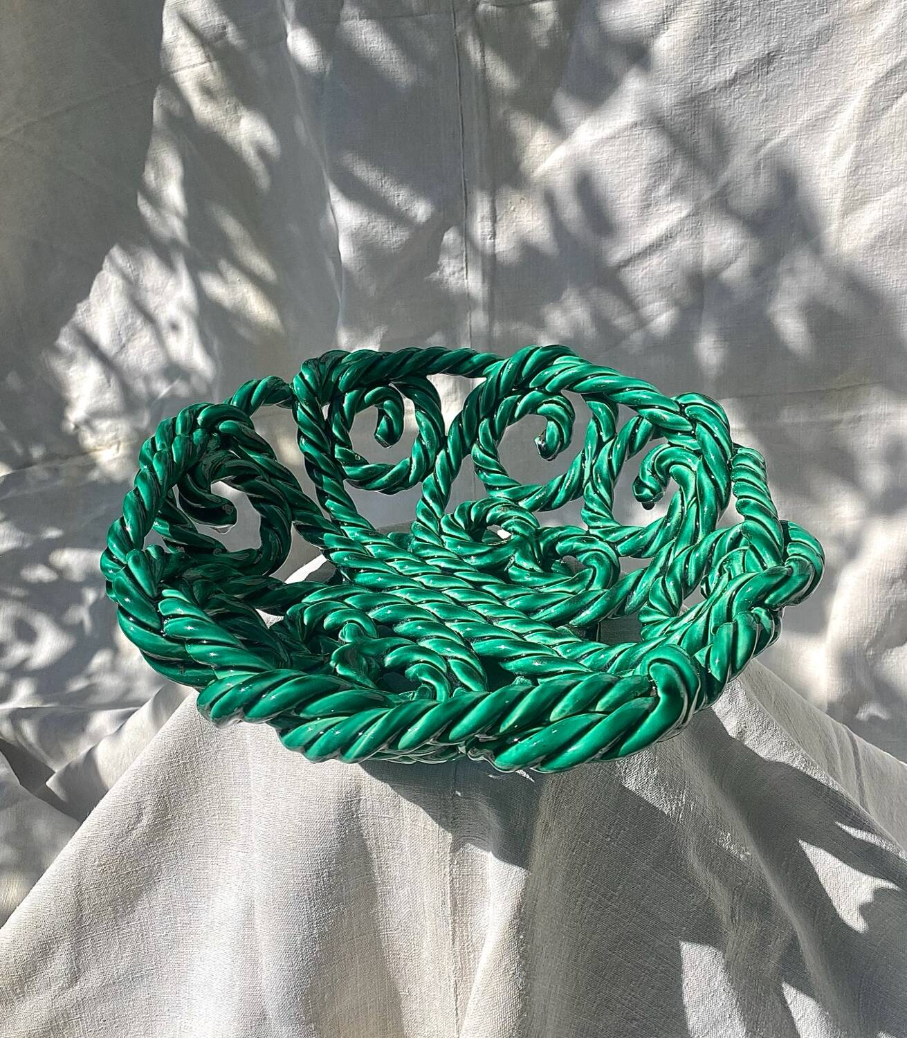 Large twisted green enamelled bowl