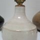 Three vintage ceramic lamps in blue, white and suede