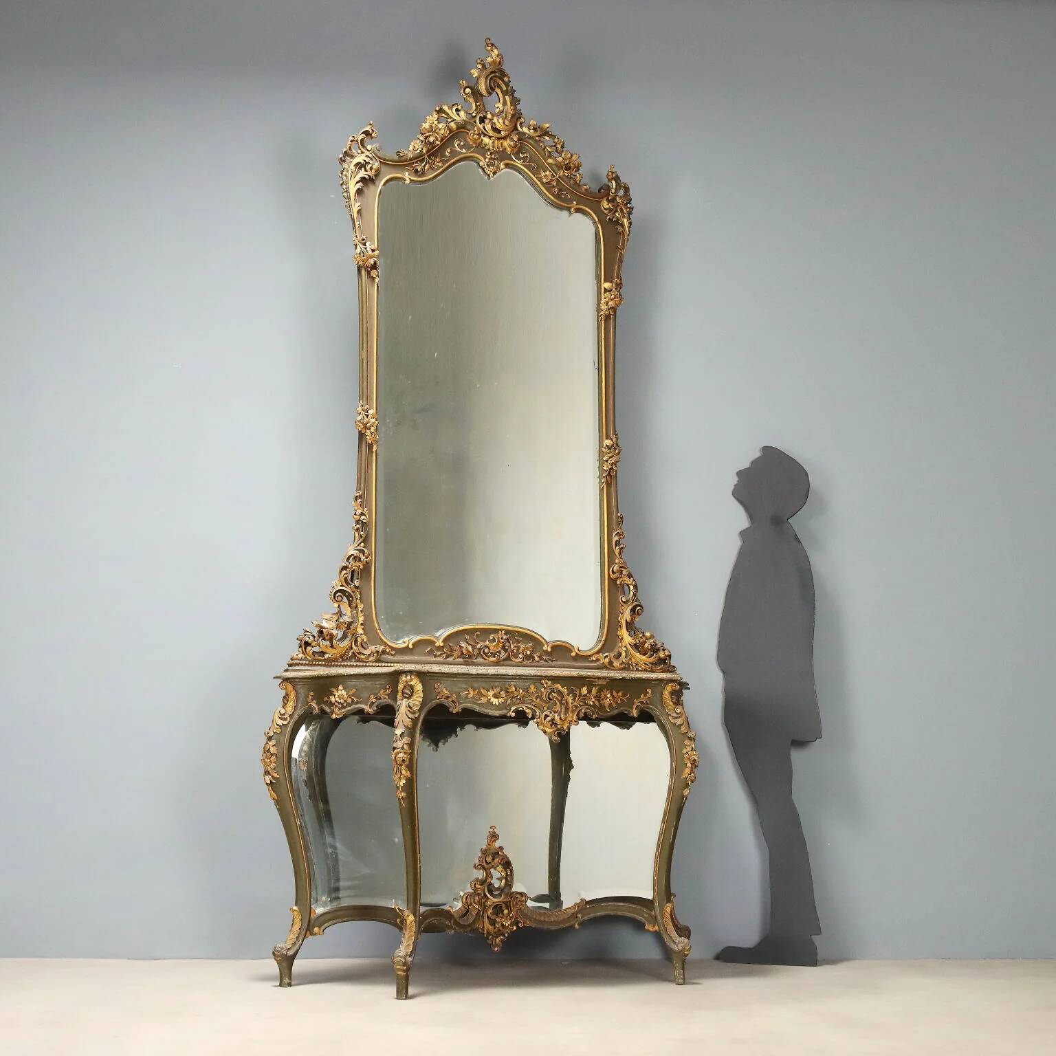Ancient baroque console with a wooden mirror, Italy, late 19th century.