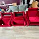 Set of 3 airborne velvet armchairs in red.