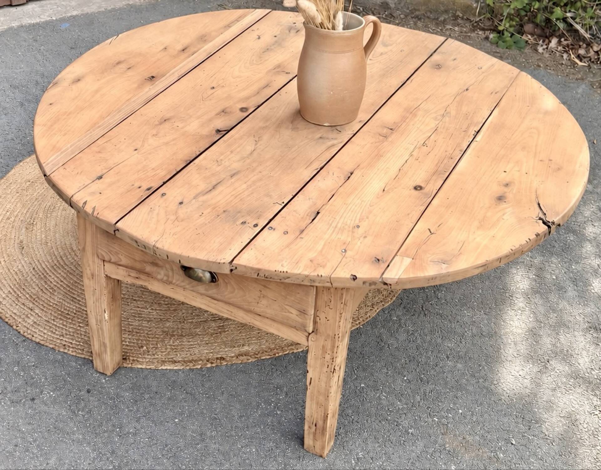 Round coffee table with 1 drawer, antique, made of raw solid wood.