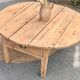 Round coffee table with 1 drawer, antique, made of raw solid wood.