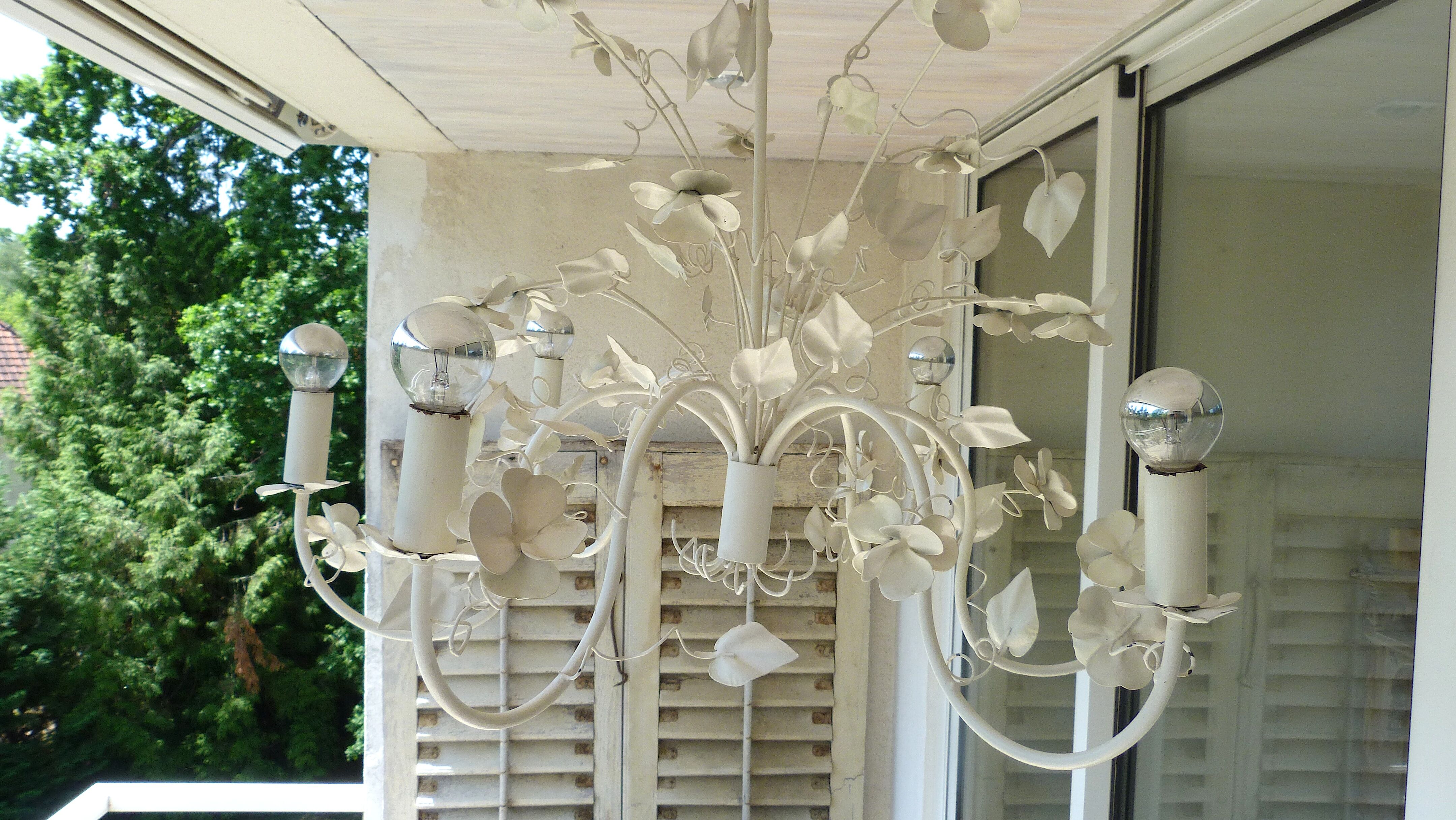 Vintage chandelier in painted metal decoration foliage and flowers