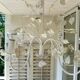 Vintage chandelier in painted metal decoration foliage and flowers