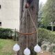 Scandinavian triple pendant light in Opaline and oak by Uno & Östen Kristiansson.