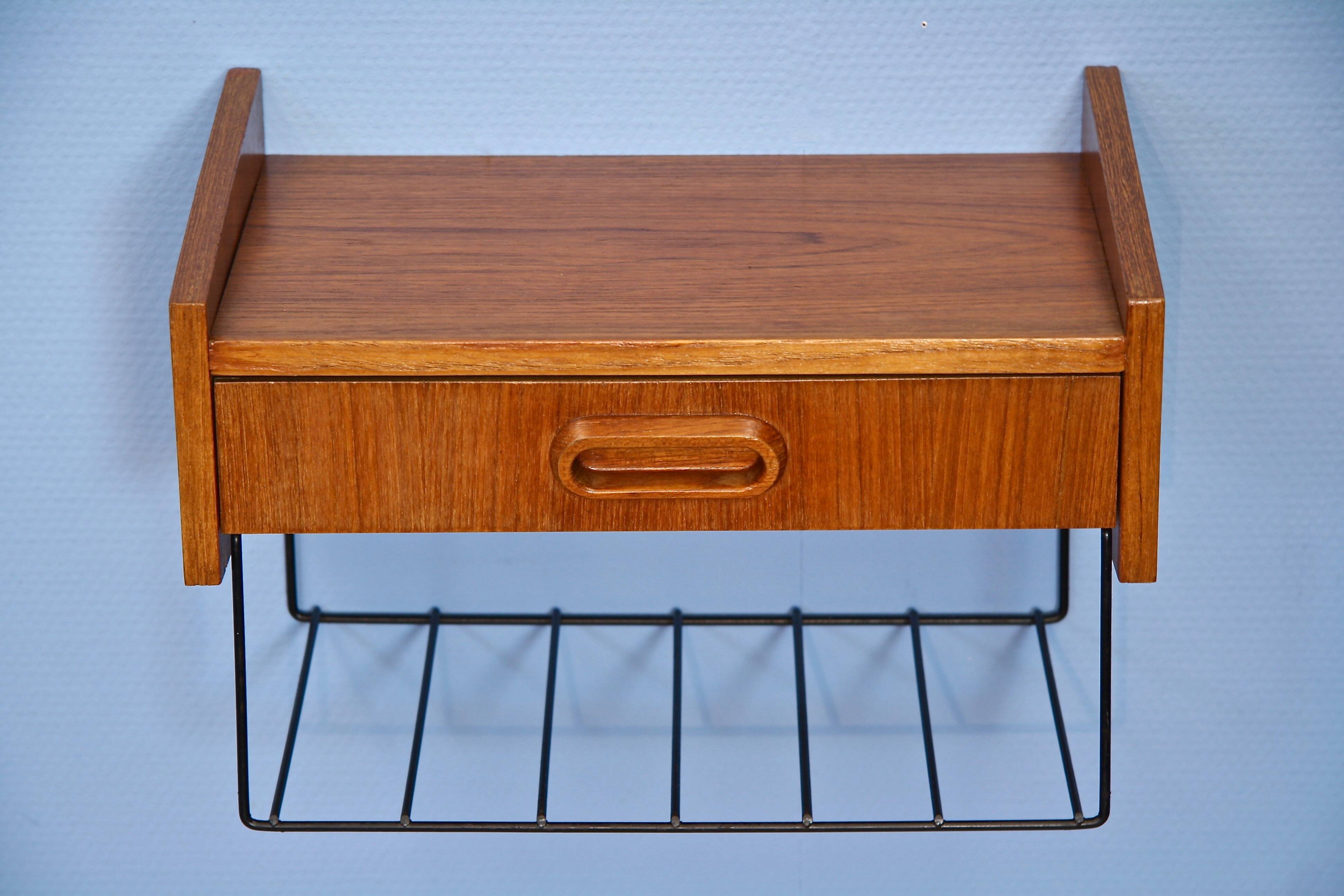 Dutch wall shelf by Tomado in teak and metal, 1960s.