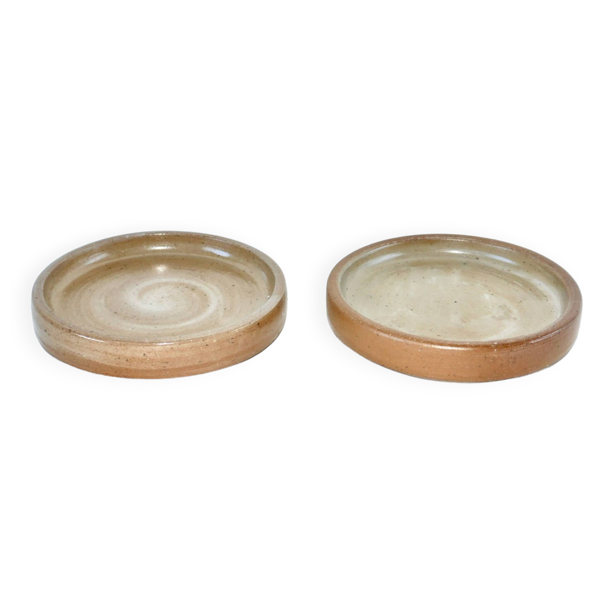 Pair of enamelled stoneware bottle coasters 1970