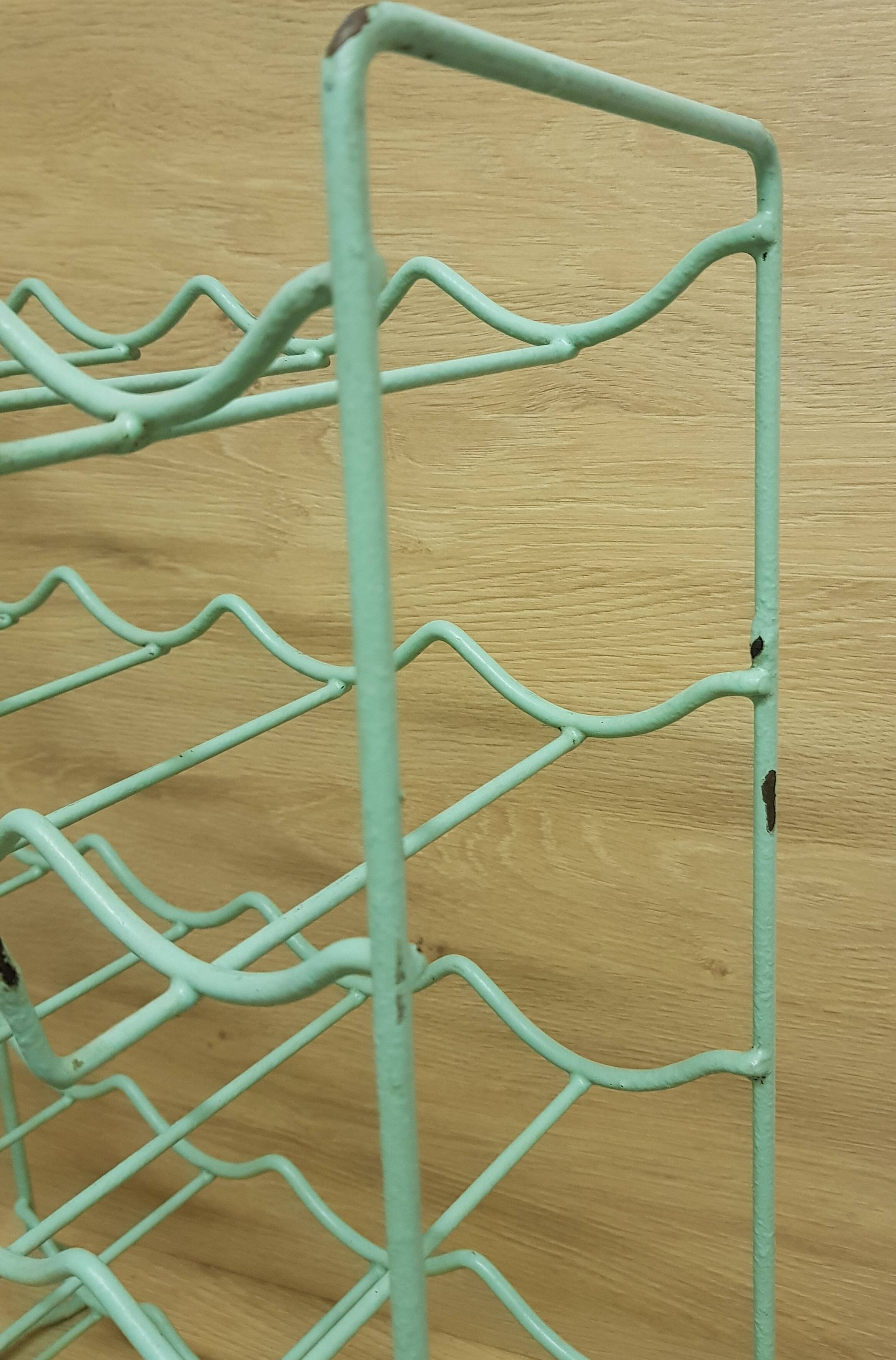 Metal aqua green bottle rack
