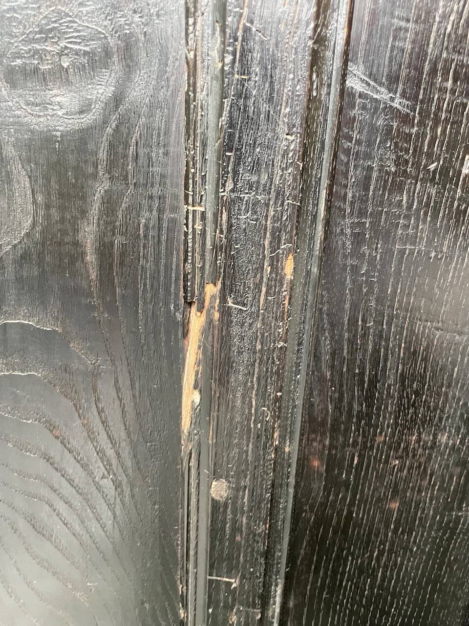 19th century chest of drawers in carved blackened pine