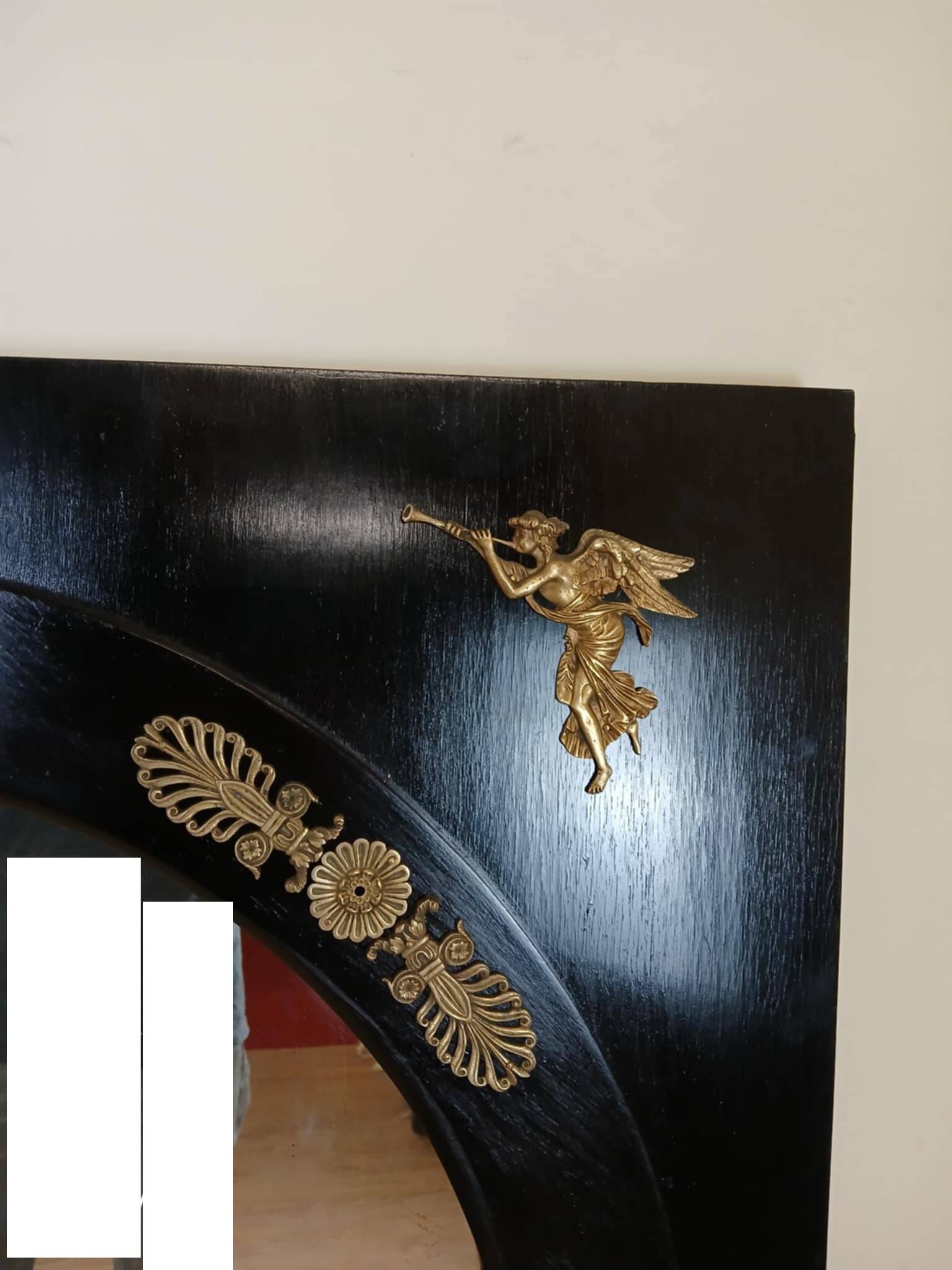 Miroir Empire en bois laqué noir et bronze doré époque XIXeme