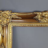 Large frame Louis XV style wood and gilded stucco patinated 78x69 cm, leaf: 55.5x46.5 cm