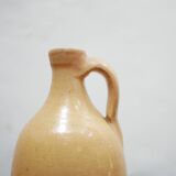 Vintage glazed terracotta bottle