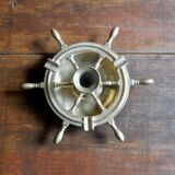 Brass ashtray and candlestick shaped boat bar