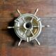 Brass ashtray and candlestick shaped boat bar