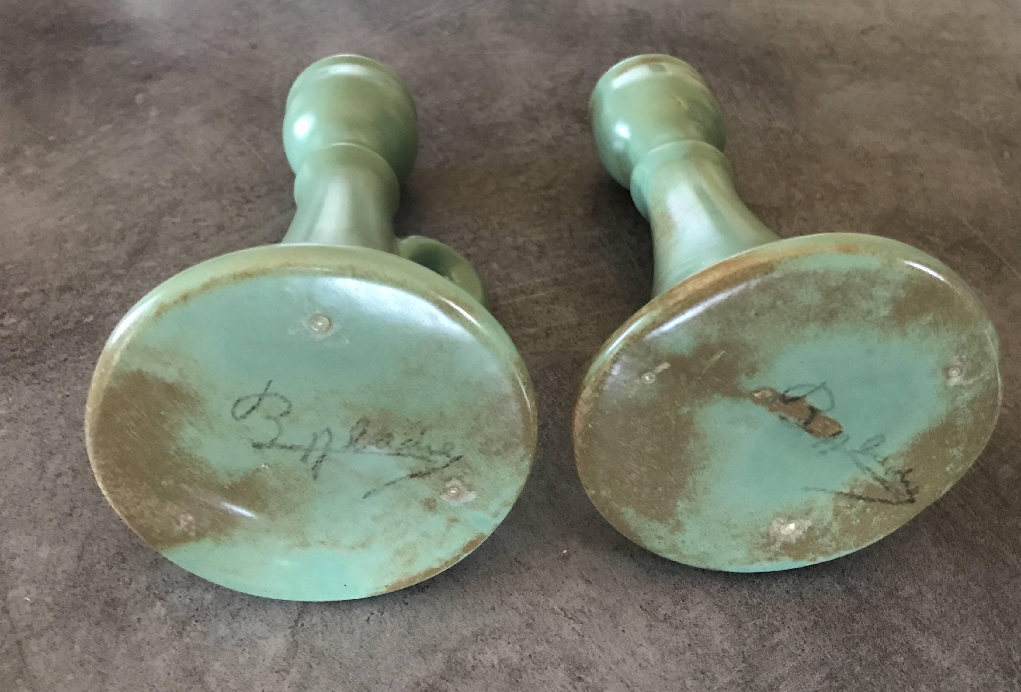 Pair of vintage table candle holders in green enameled ceramic