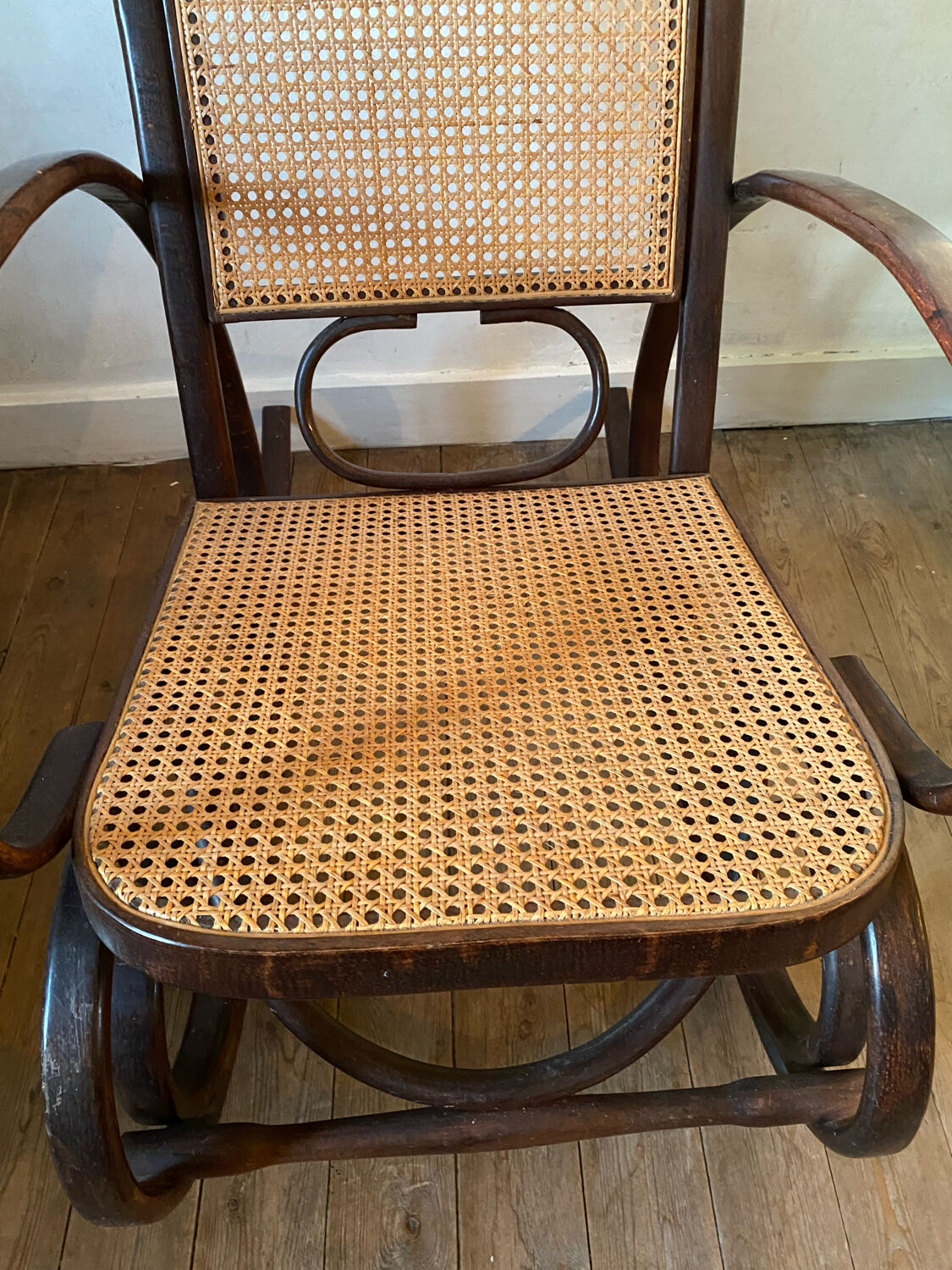 Wood and cane rocking chair