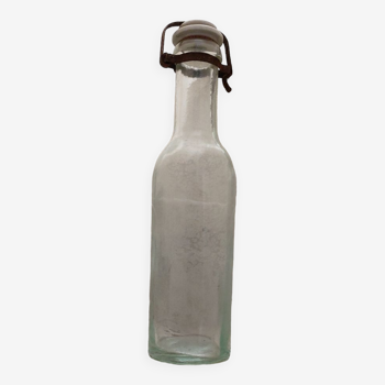 Old milk bottle with rare porcelain cap