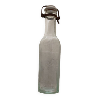 Old milk bottle with rare porcelain cap