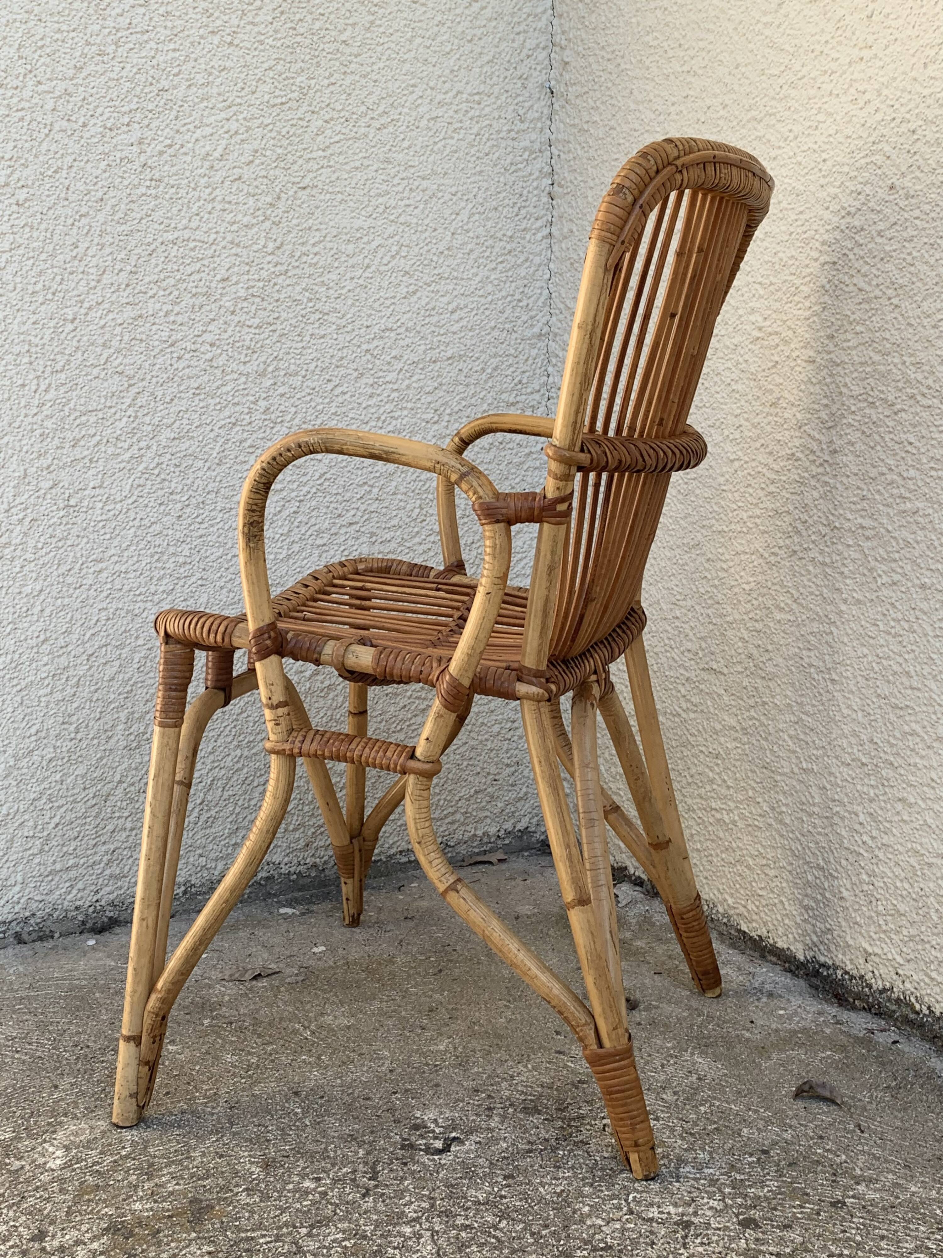 Chair and armchair in vintage rattan 1950
