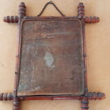 Old mirror in turned wood