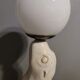White ceramic sea lion lamp and opaline globe