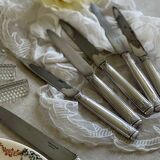 12 antique Christofle knives.