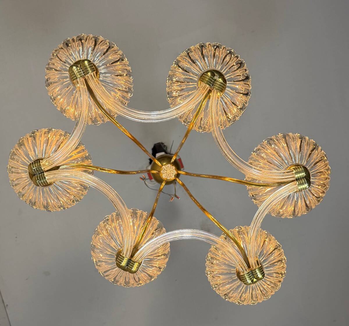 Venetian chandelier in colourless Murano glass and brass, circa 1940.