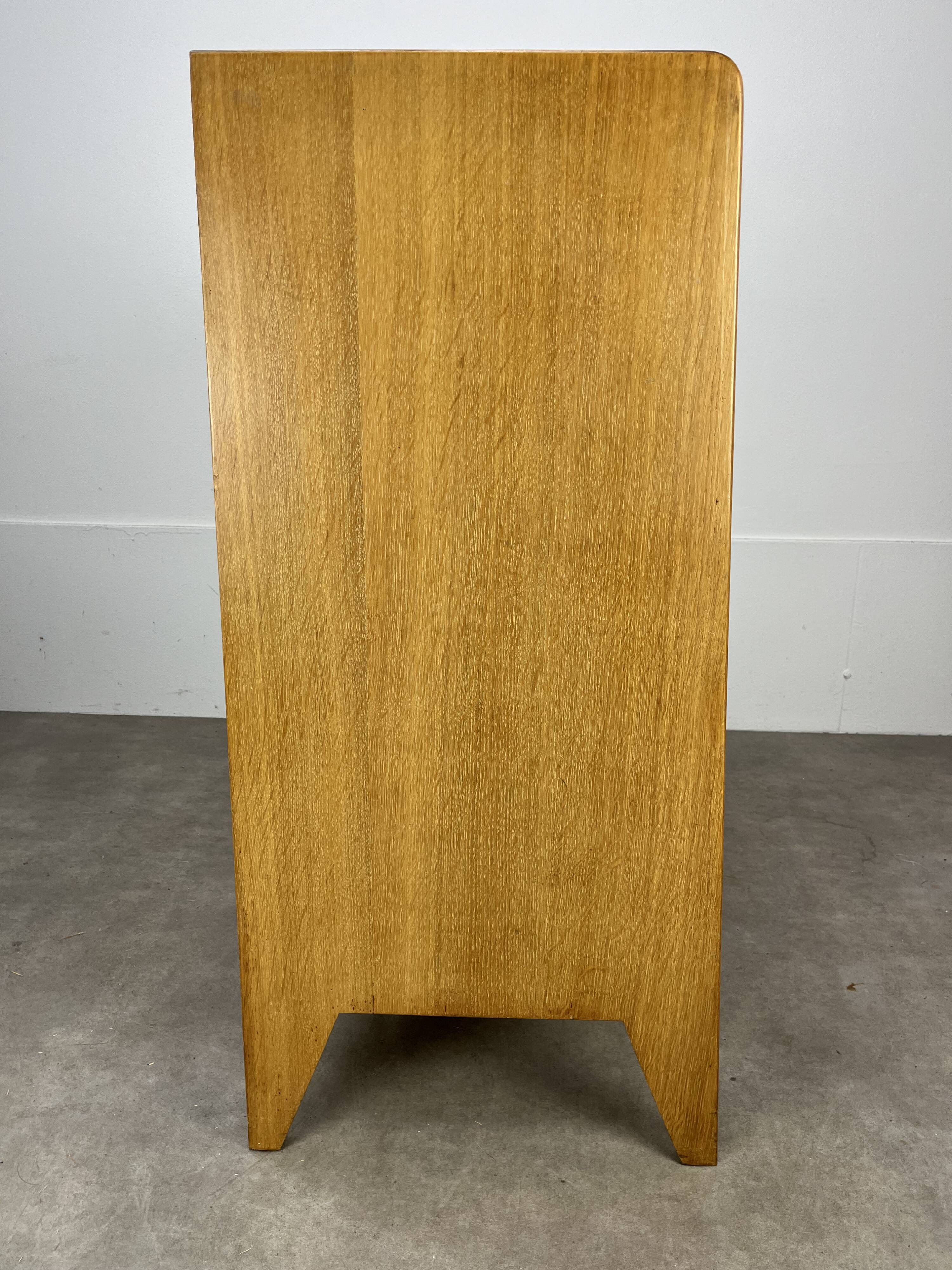 50s chest of drawers with blond wood compass feet