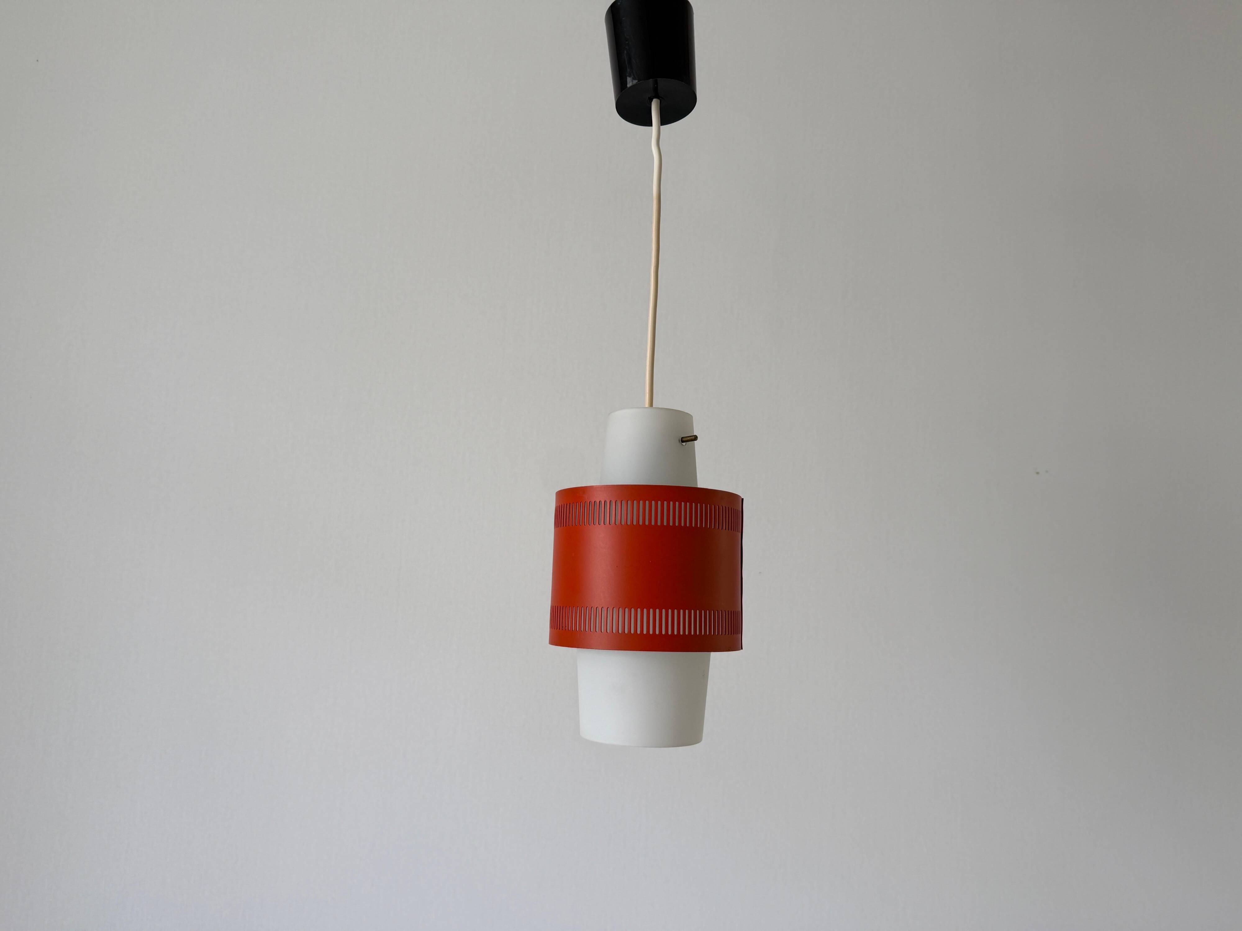 Glass ceiling light with an orange metal frame, 1960s, Germany.