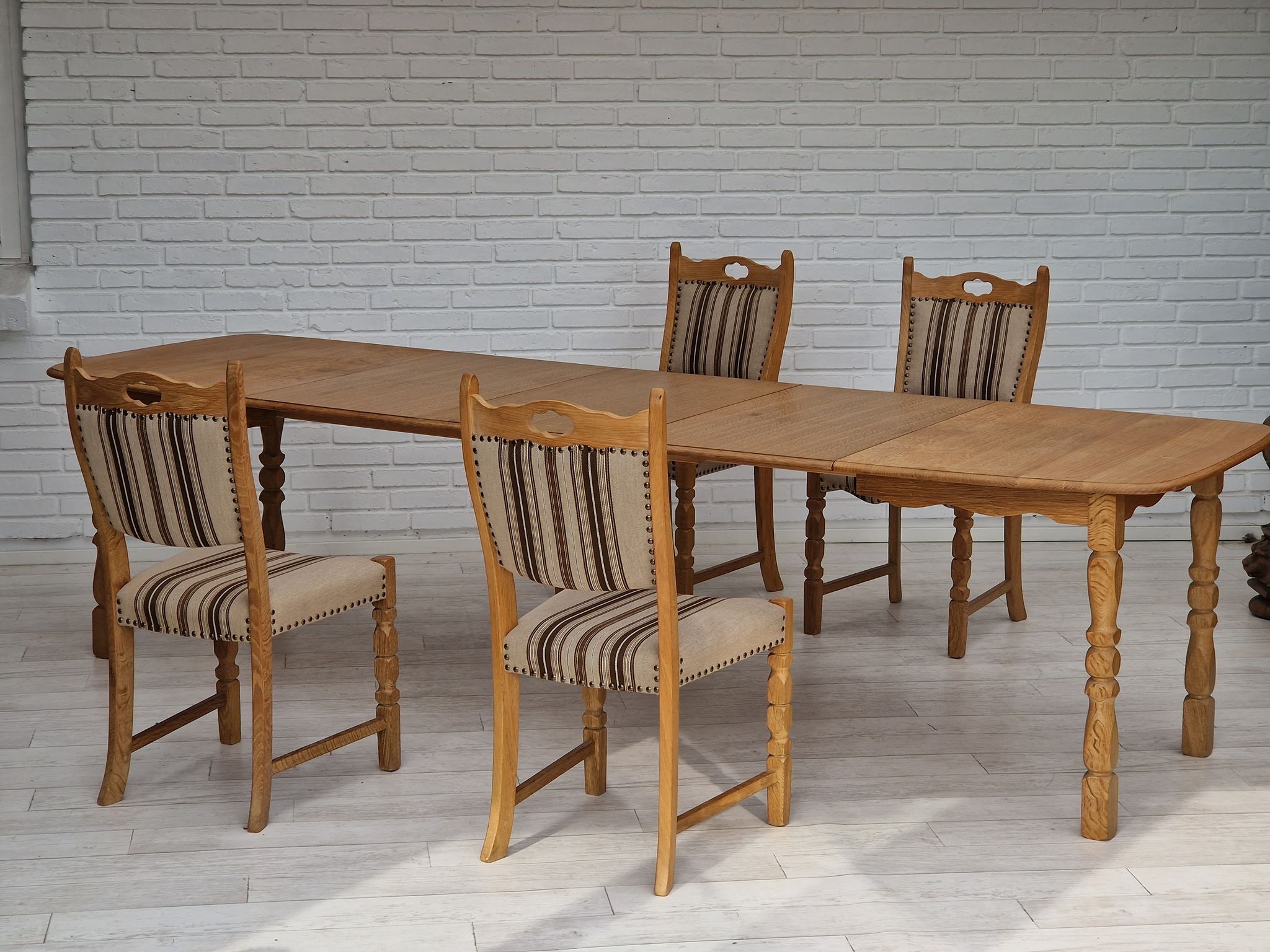 Danish dinning set of table and four chairs in oak and wool.