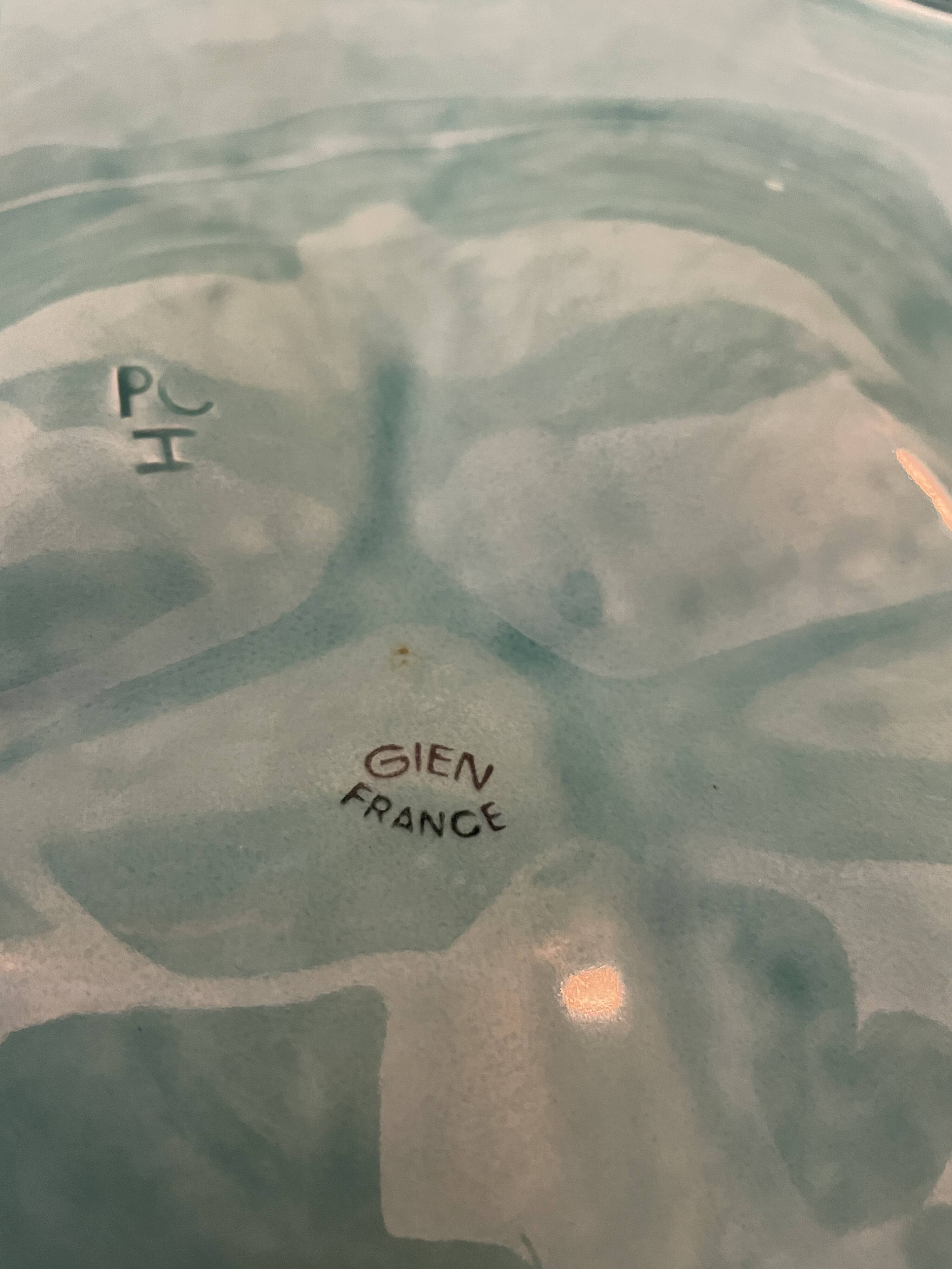 Dish and 4 turquoise faience oyster plates from Gien, France.