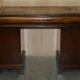 Victorian antique partner's desk in veined walnut with a leather top.