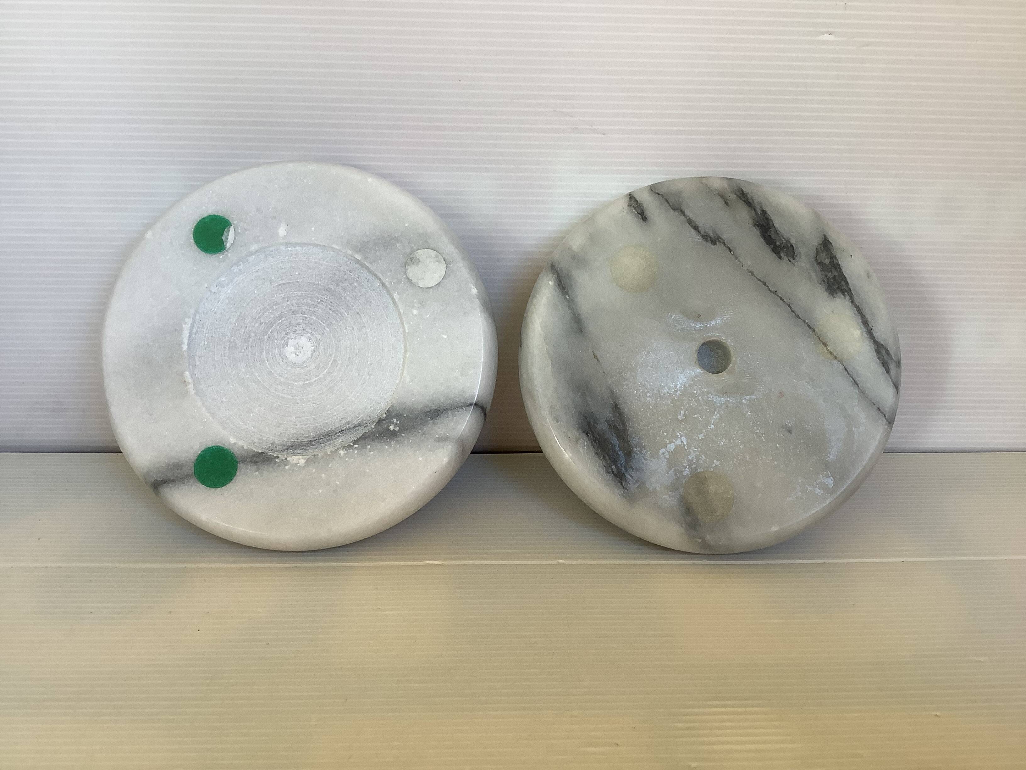 Pair of white and grey marble candlesticks