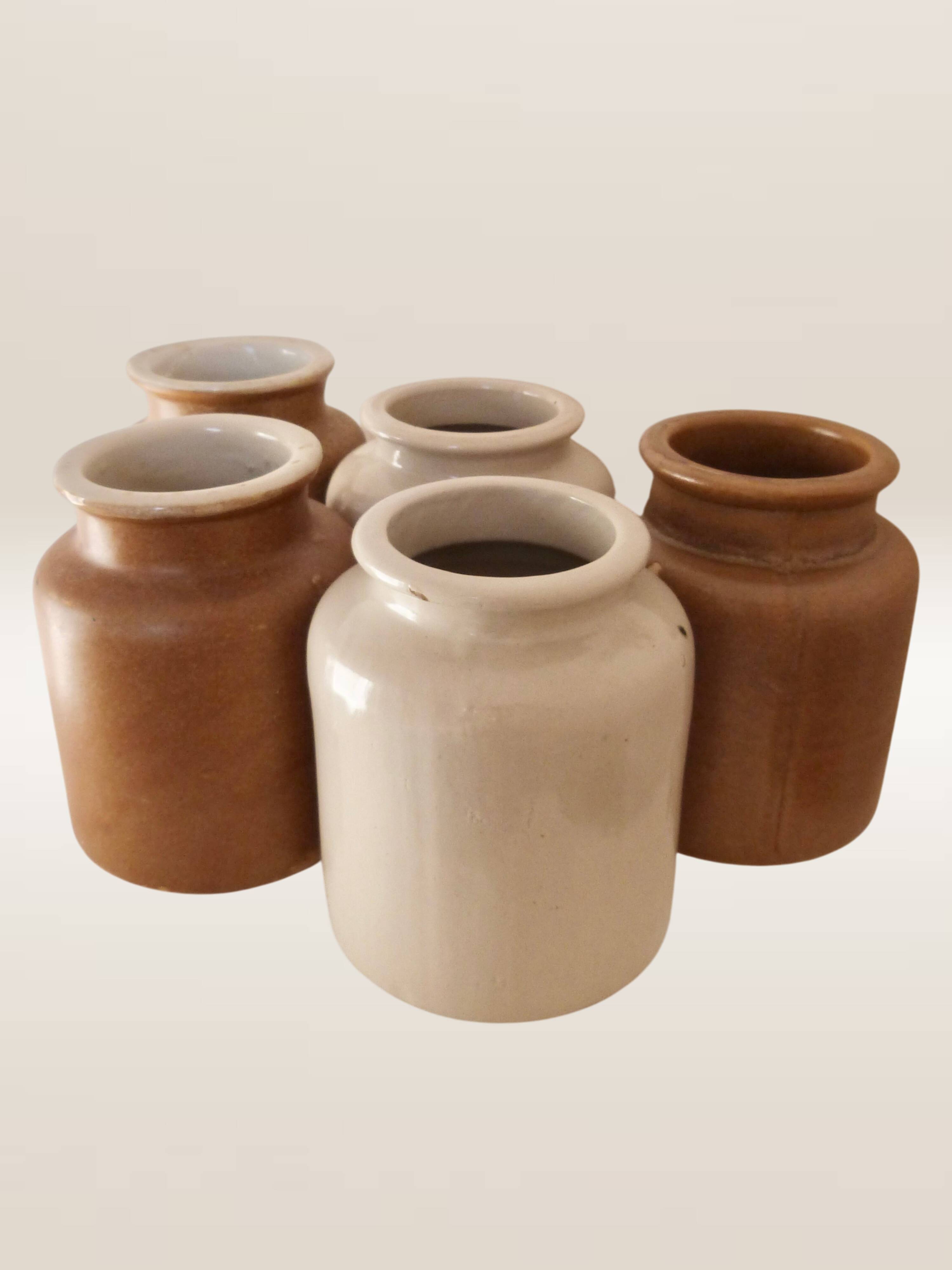Set of five stoneware mustard pots