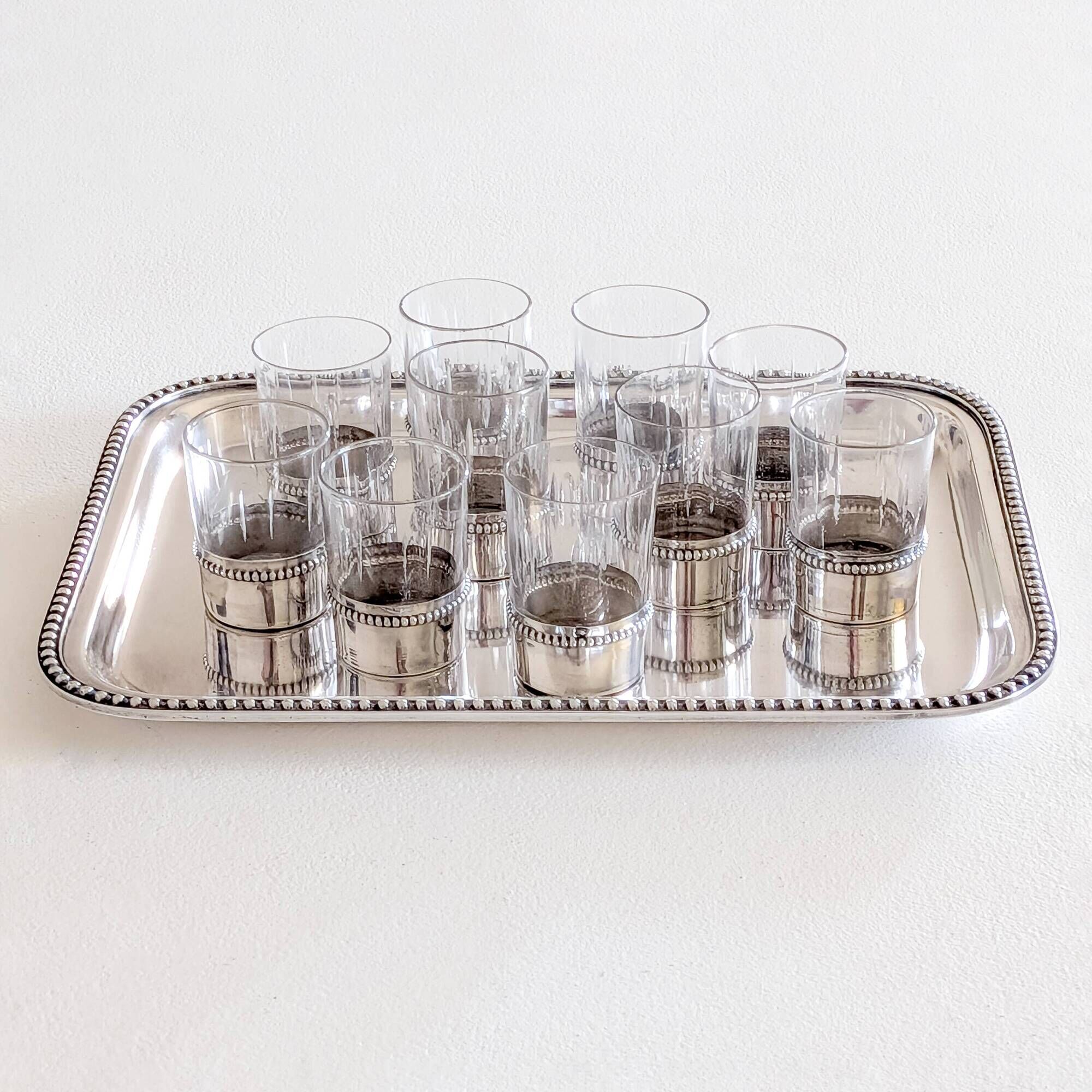 Liqueur service with 10 crystal glasses, solid silver and tray.