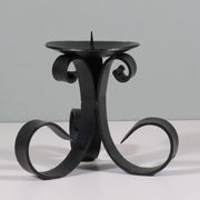 Vintage wrought iron chandelier for large candle.