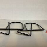 Pair of black metal bookends A