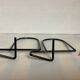 Pair of black metal bookends A